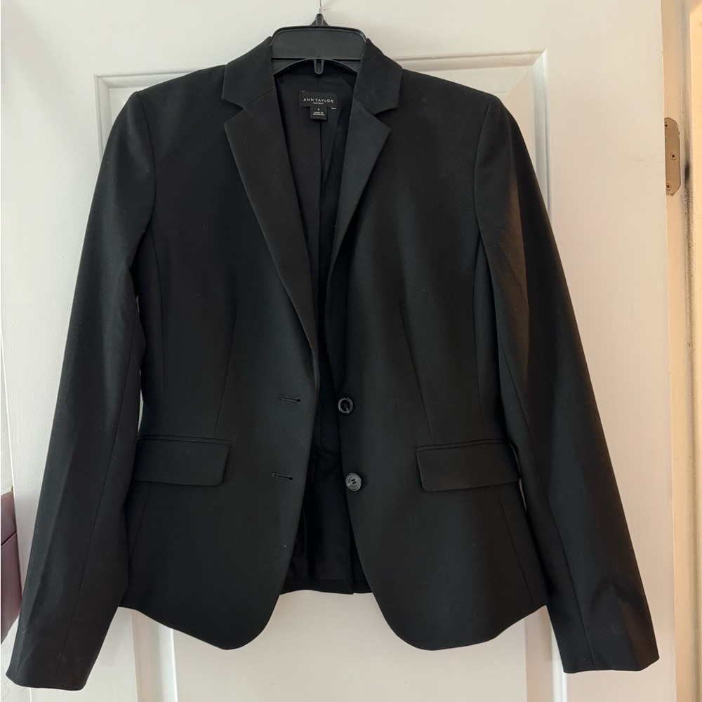 Black blazer great for work or going out! Professional worn twice